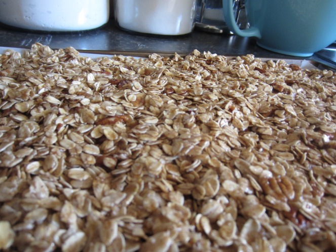 Make sure the granola is spread out in an even layer.